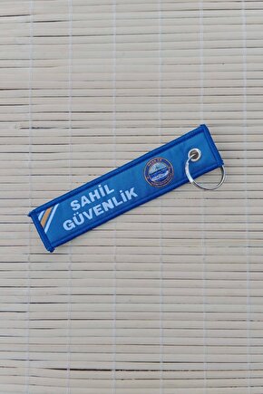 Sahil guvenlik tcsg 24 yazili mavi beyaz nakis islemeli bez anahtarlik