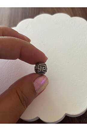 Çelik charm