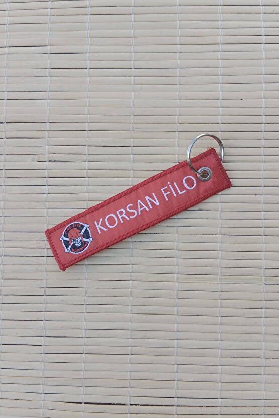 korsan filo yazili kirmizi beyaz nakis islemeli bez anahtarlik