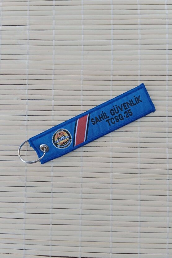Sahil guvenlik tcsg 25 yazili mavi beyaz nakis islemeli bez anahtarlik