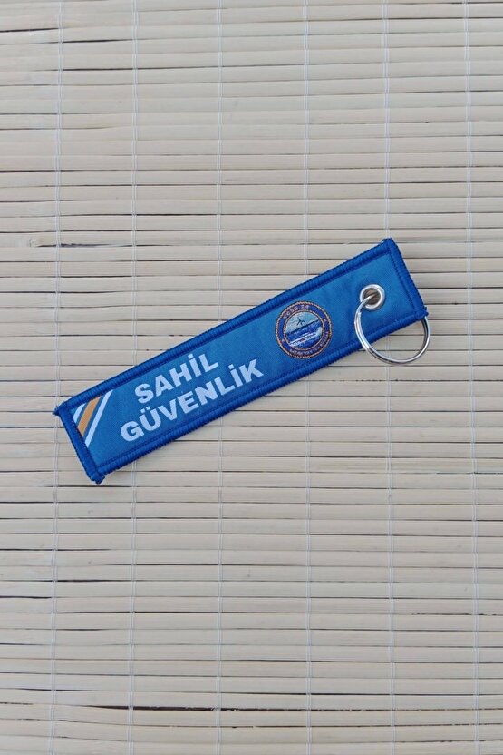 Sahil guvenlik tcsg 24 yazili mavi beyaz nakis islemeli bez anahtarlik
