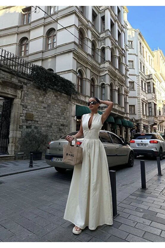 Dik Yuvarlak Yaka Önden Fermuarlı Sifir Kol Beli Oturtmalı Kolsuz Cepli Çan Etekli Uzun Elbise - Bey