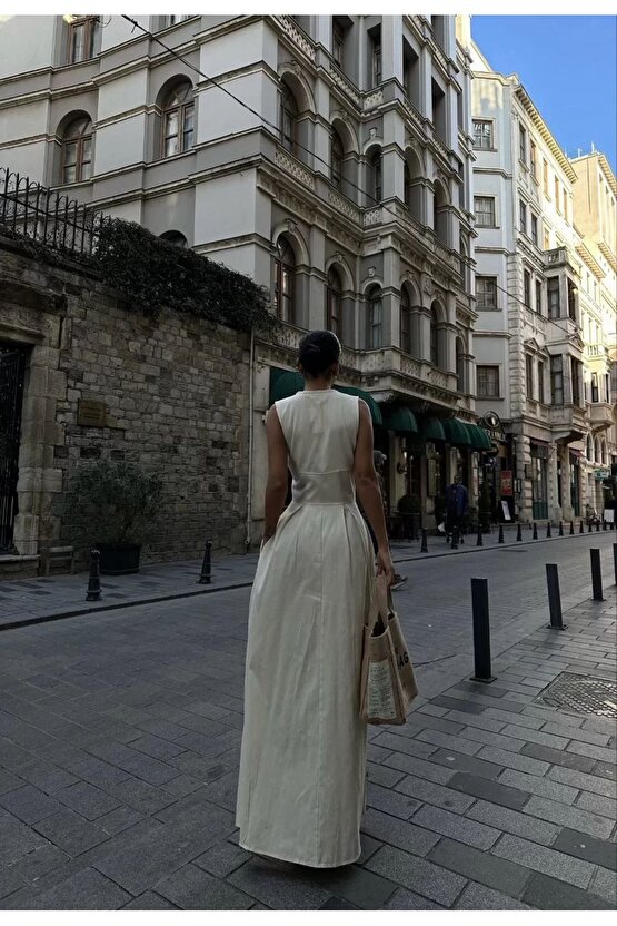 Dik Yuvarlak Yaka Önden Fermuarlı Sifir Kol Beli Oturtmalı Kolsuz Cepli Çan Etekli Uzun Elbise - Bey