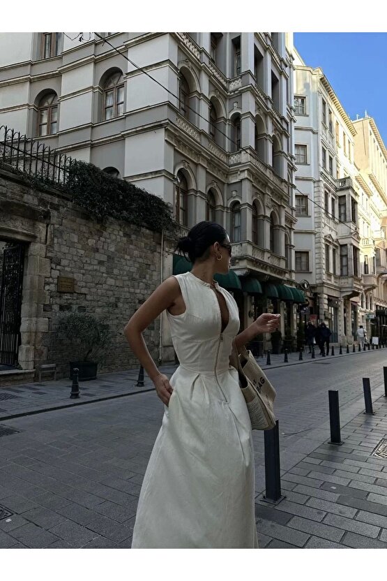 Dik Yuvarlak Yaka Önden Fermuarlı Sifir Kol Beli Oturtmalı Kolsuz Cepli Çan Etekli Uzun Elbise - Bey