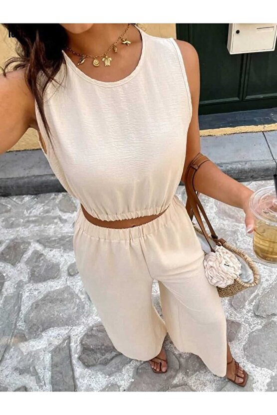 Kadın kolsuz beli lastikli atlet ve yırtmaç detay pantolon ikili takım Gül Figürlü Kolye hediye