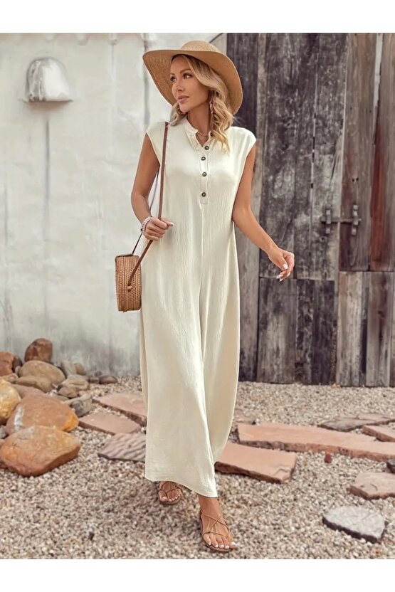 Kadın Kısa Kollu önden Düğmeli Paçaya Doğru Geniş Cepli Uzun Bürümcük Tulum