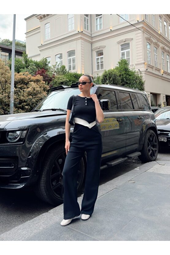 Gökyüzü Moda Kadın Bisiklet Yaka Asimetrik Kesim Atlet Detay Bluz Ve Yüksek Bel Bol Paça Pantolon Ik