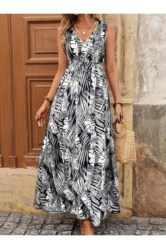 Gökyüzü Moda Kadın Askılı V Yakalı Belden Bağcıklı Geniş Kesim Desenli Süprem Elbise