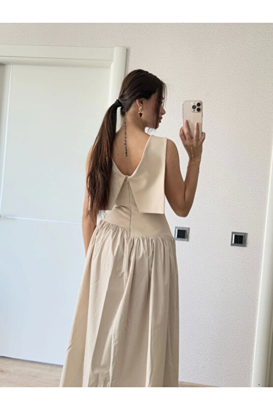 Gökyüzü Moda Arkası Kanatlı Uzun Elbise- Bej