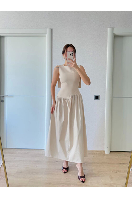Gökyüzü Moda Arkası Kanatlı Uzun Elbise- Bej
