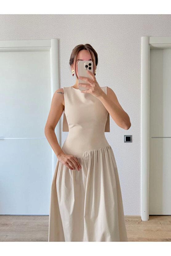 Gökyüzü Moda Arkası Kanatlı Uzun Elbise- Bej