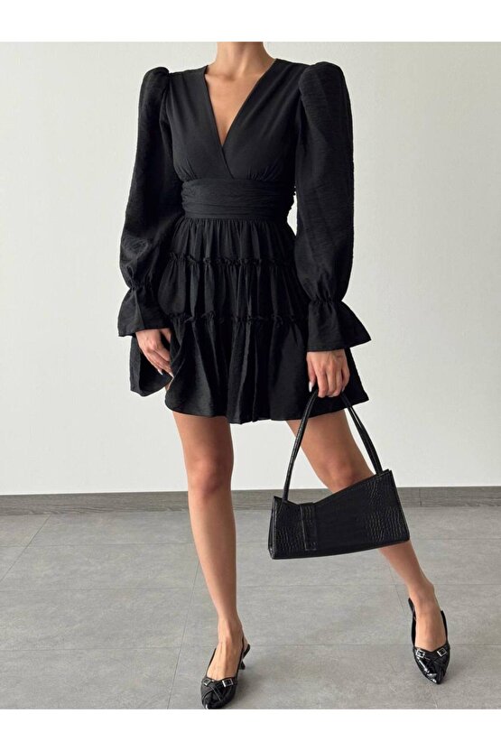 V Yaka Balon Kol Belden Oturtmalı Aerobin Kumaş Mini Boy Siyah Elbise