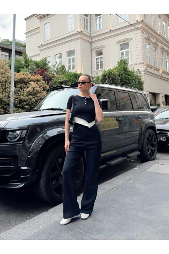 Kadın Bisiklet Yaka Asimetrik Kesim Atlet Detay Bluz Ve Yüksek Bel Bol Paça Pantolon Ikili Takım