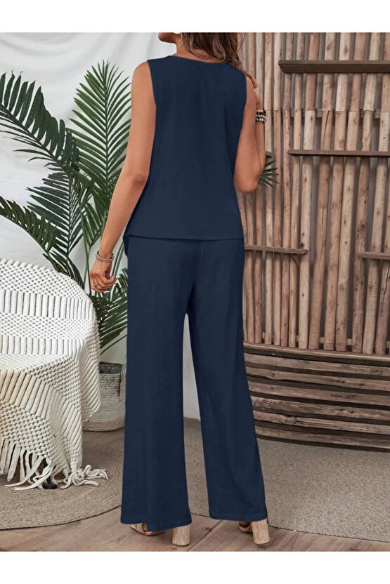 Kadın Kolsuz Düğmeli Asimetrik Detaylı Bürümcük Bluz Ve Pantolon Takım