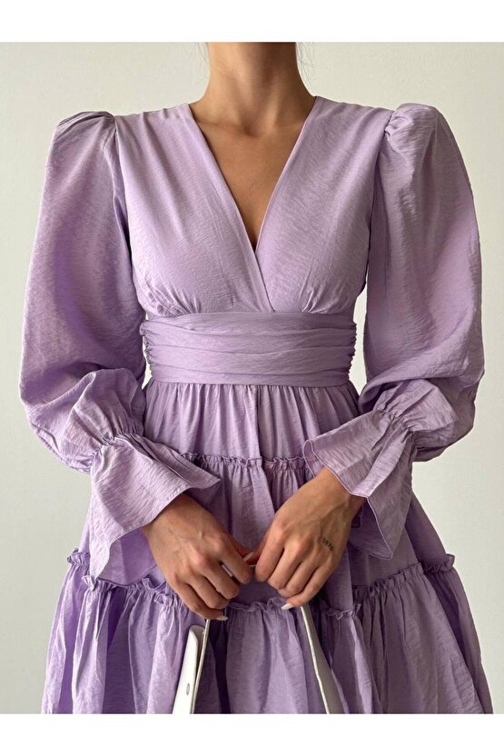 V Yaka Balon Kol Belden Oturtmalı Aerobin Kumaş Mini Boy Lila Elbise