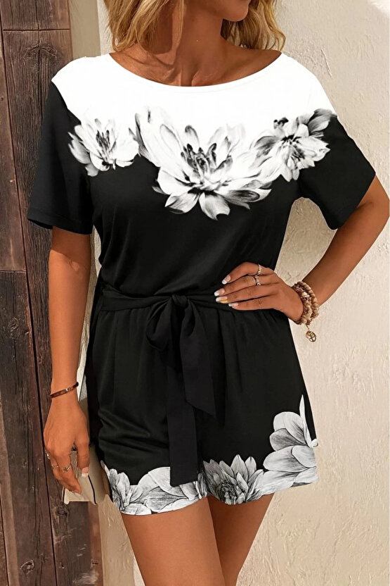 Kadın Tek Omuzu Açık çiçek Desenli Beli Kuşaklı Iki Iplik Mini Short Tulum