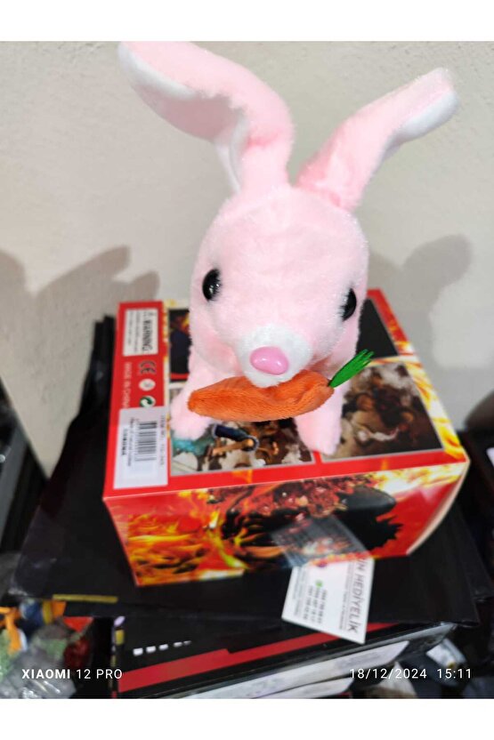 Tivens Elektronik Pilli Sesli Zıplayan Hareketli Havuçlu Peluş Tavşan 18x17 Cm kaliteli ürün