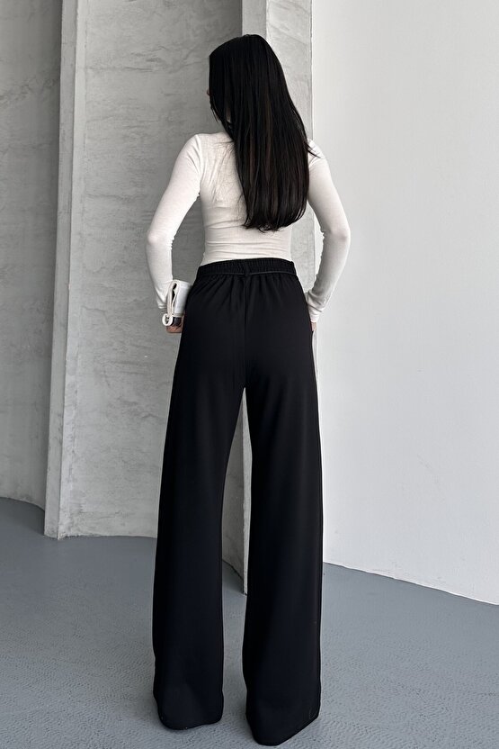 Kadın Yüksek Bel Bağcıklı Bol Paça Palazzo Pantolon – Rahat Kesim Günlük & Şık