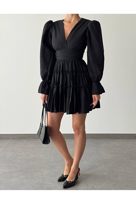 V Yaka Balon Kol Belden Oturtmalı Aerobin Kumaş Mini Boy Siyah Elbise