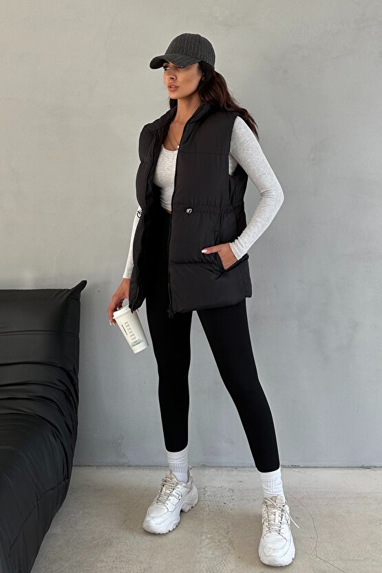 Kadın Siyah Şişme Yelek - Kapüşonsuz Uzun Fermuarlı Cepli Kışlık Spor Şişme Mont Yelek