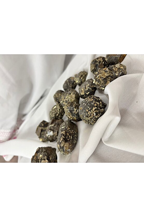 Pirit taşı. 34-140gr arasında değişiklik gösterebilir