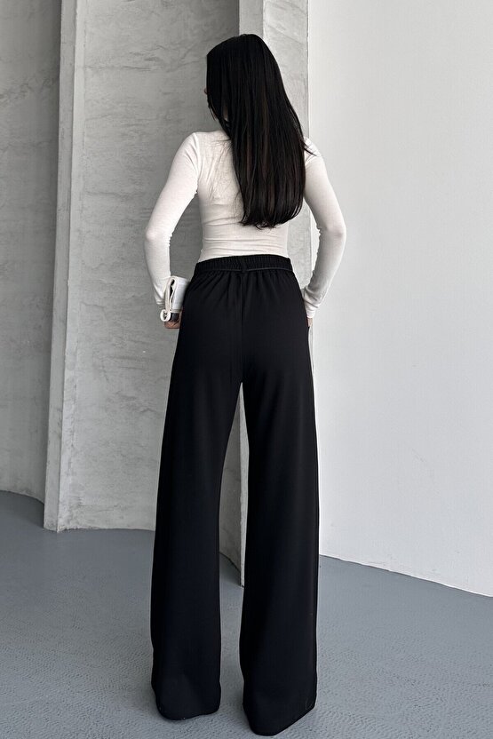 Kadın Yüksek Bel Bağcıklı Bol Paça Palazzo Pantolon – Rahat Kesim Günlük & Şık