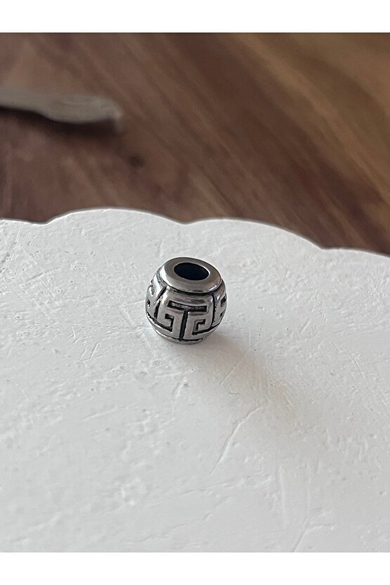 Çelik charm