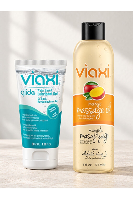 Glide Su Bazlı Kayganlaştırıcı Jel 50 ml + Mangolu Masaj Yağı 177 ml – İkili Masaj ve Konfor Seti