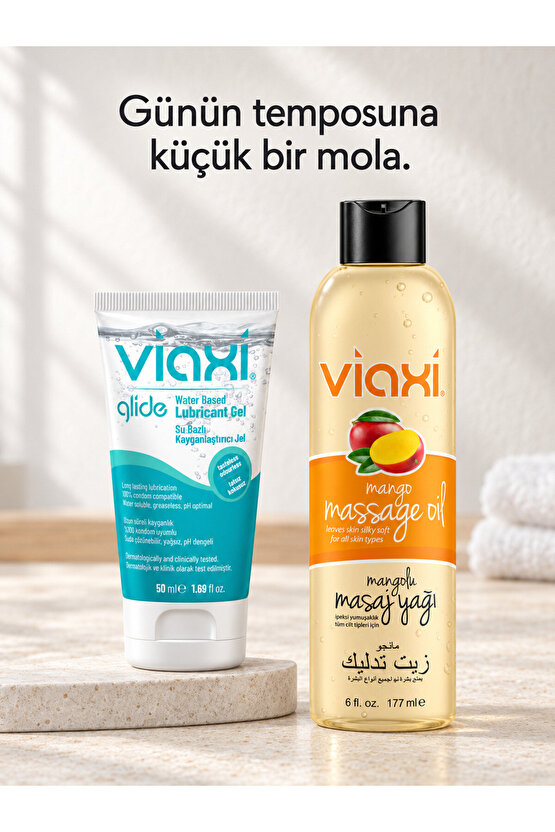 Glide Su Bazlı Kayganlaştırıcı Jel 50 ml + Mangolu Masaj Yağı 177 ml – İkili Masaj ve Konfor Seti