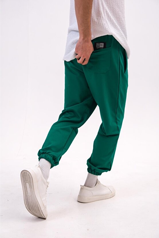 Erkek Çıma Modelli Bol Kalıp Cep Detaylı Yeşil Renk Eşofman Altı